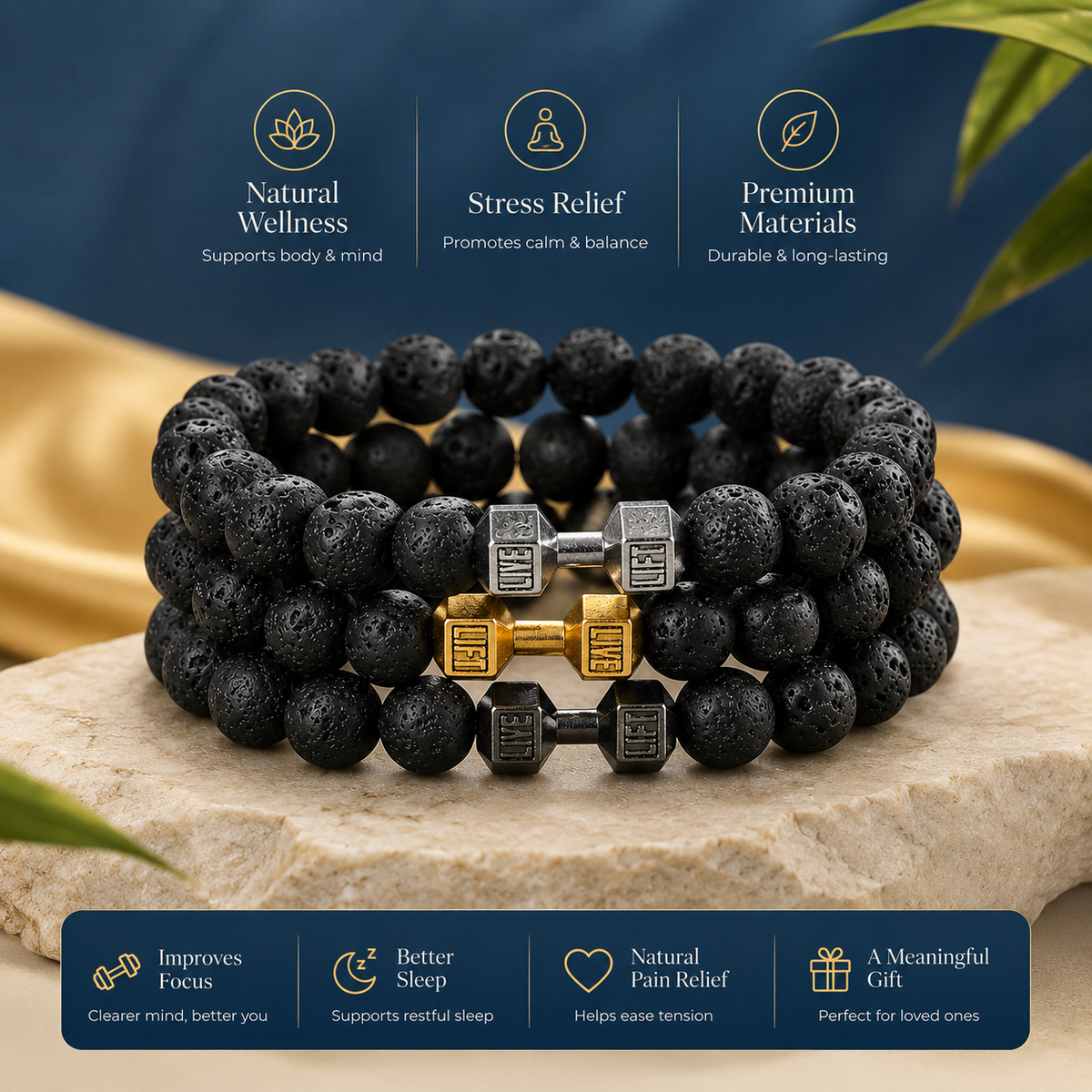 A set of black lava stone beaded bracelets with gold and silver dumbbell charms, displayed on a stone slab with a gold fabric backdrop and a dark blue background with text overlays.